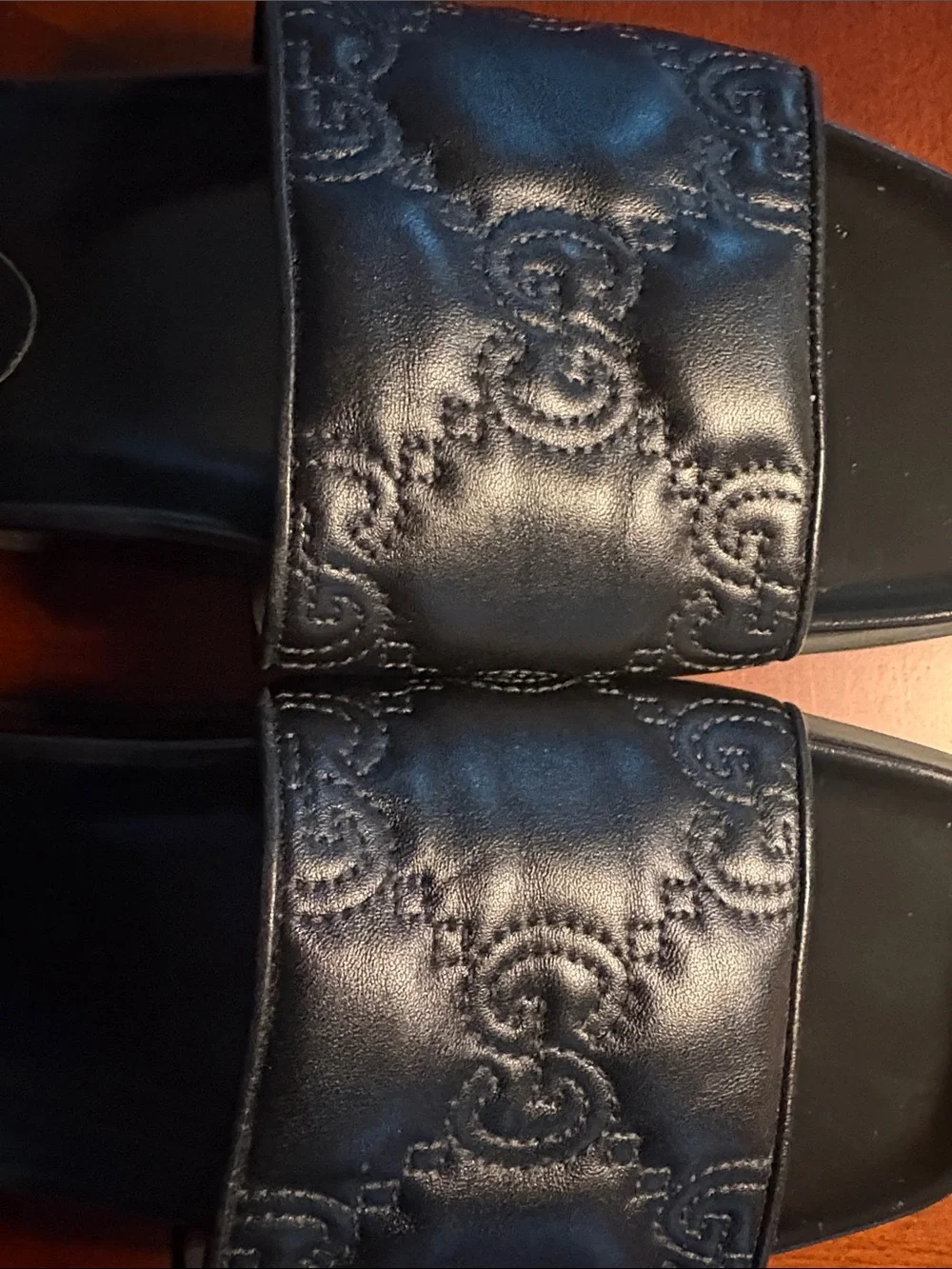 Gucci Black Embossed Logo Slide Sandals